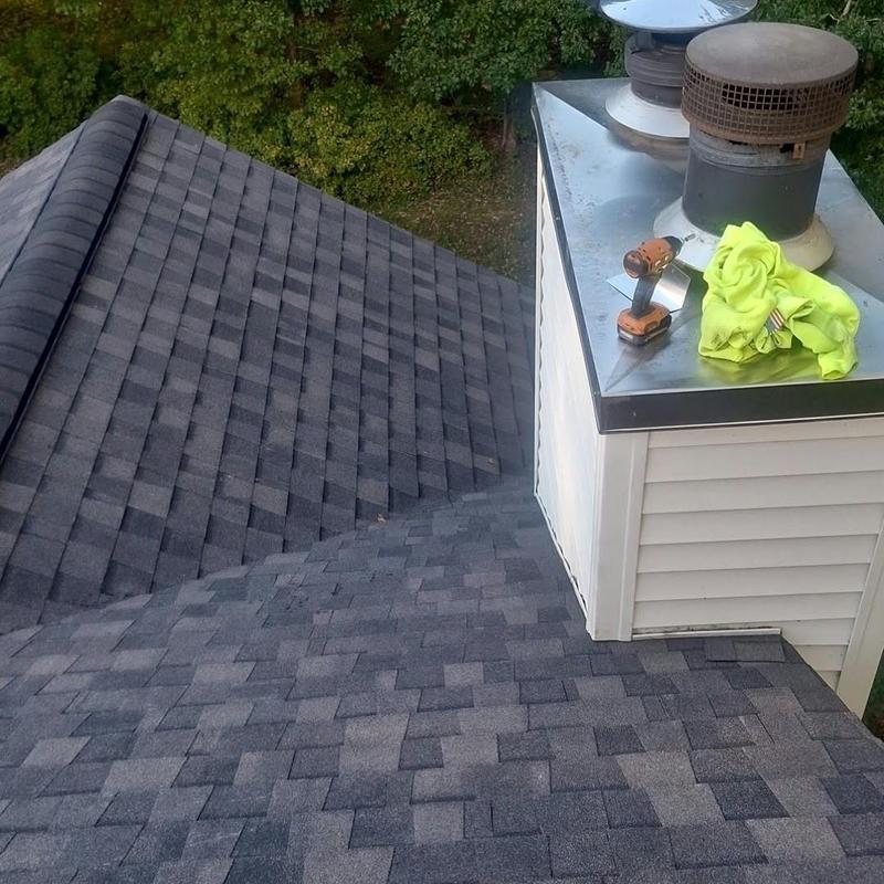 CertainTeed Landmark Pro shingles on new roof near chimney