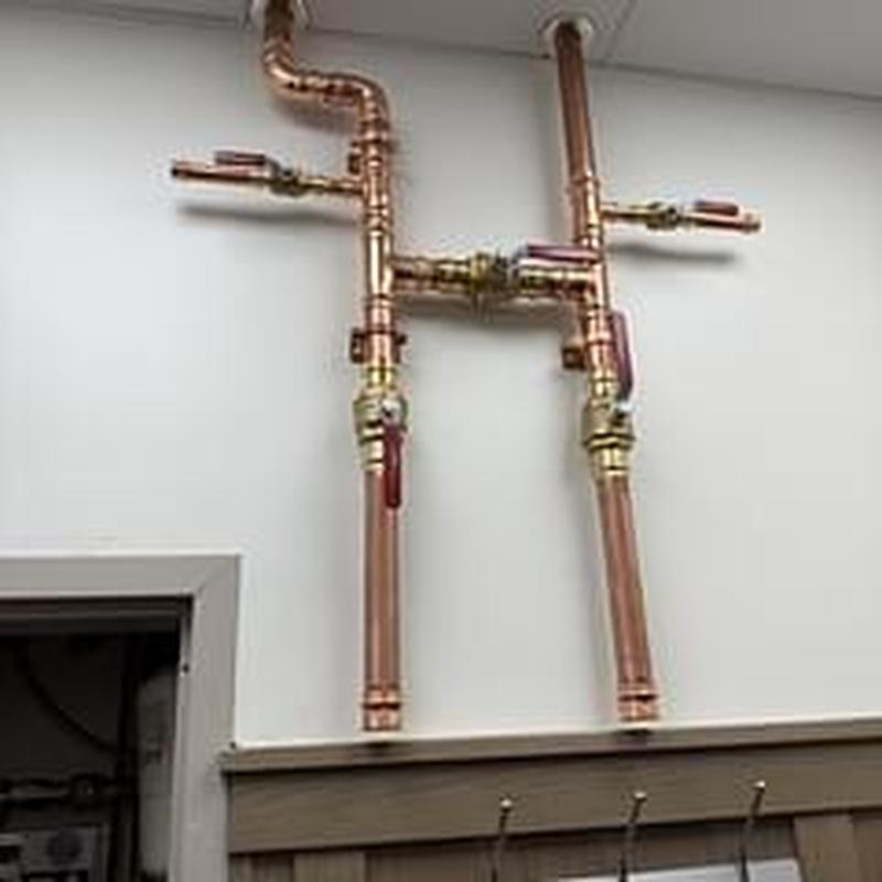 Three way valve bypass with copper piping installation