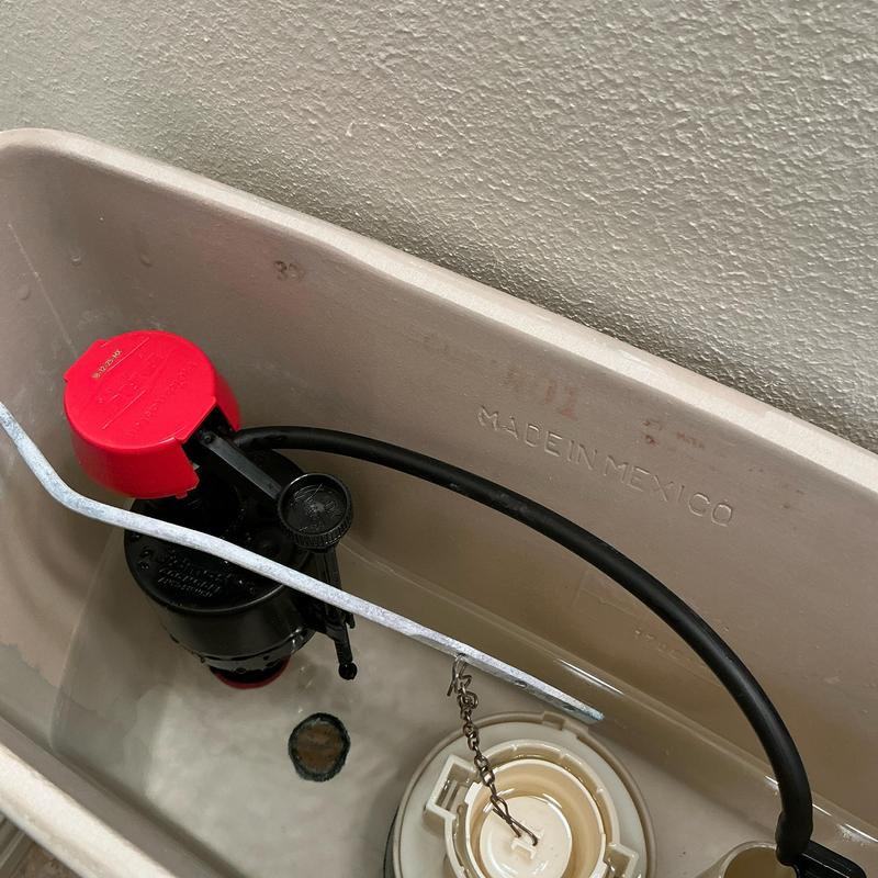 Toilet fill valve system inside tank with new valve