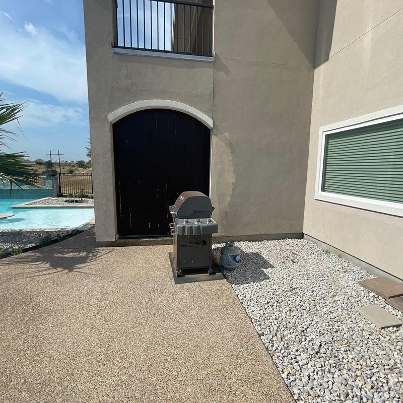 Stucco wall repair near raised patio and balcony railing Stucco wall repair near raised patio and balcony railing