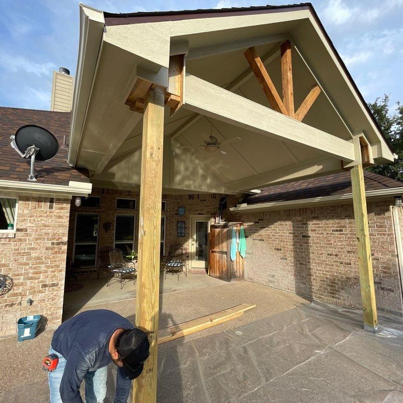 Patio support posts installation under outdoor roof Patio support posts installation under outdoor roof