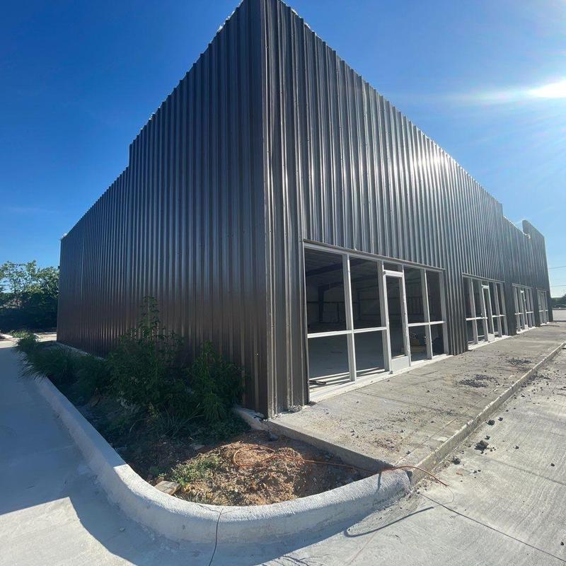 Concrete walkways and curb around commercial building Concrete walkways and curb around commercial building