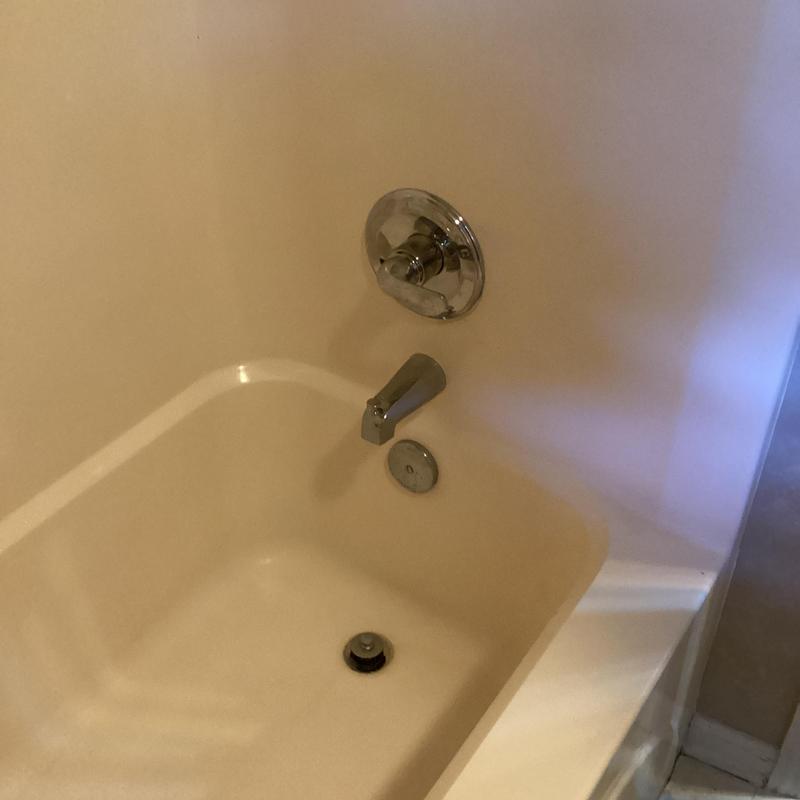 Shower tub valve and spout with chrome trim installed Shower tub valve and spout with chrome trim installed
