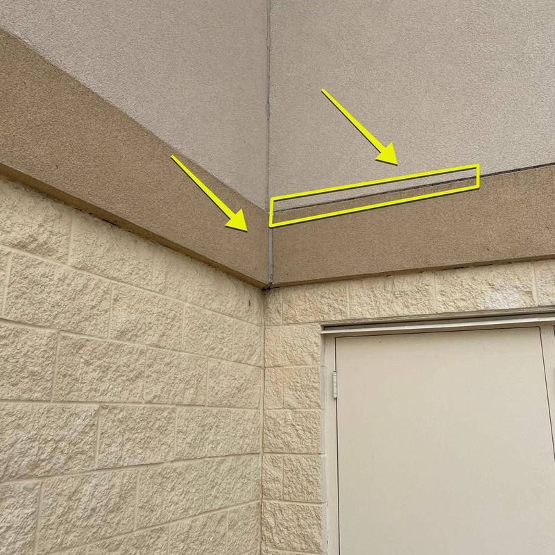 Stucco joint cracks and wall trim at exterior corner Stucco joint cracks and wall trim at exterior corner