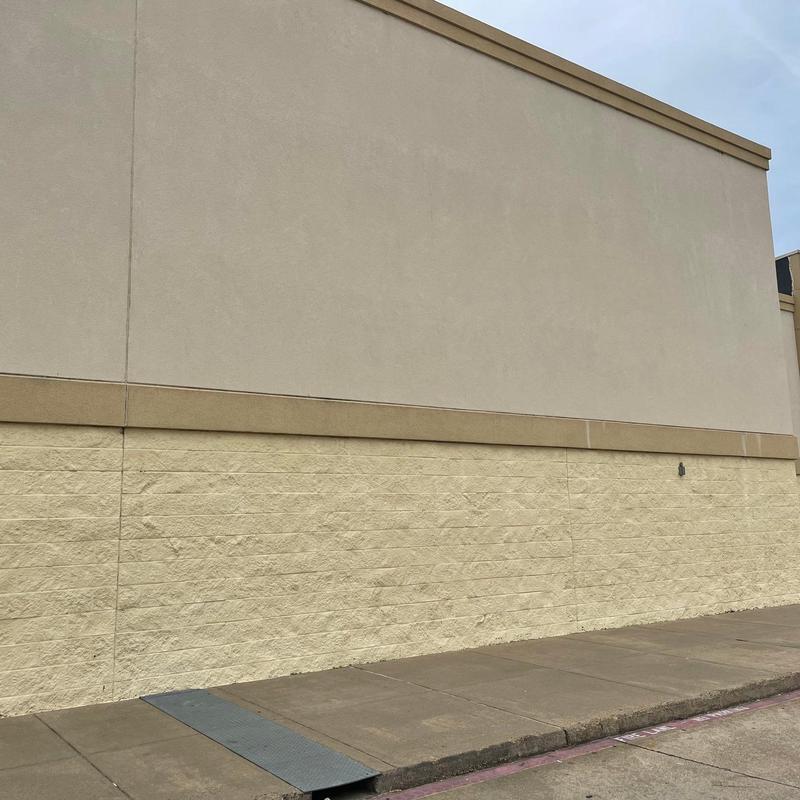 Stucco exterior wall patching on commercial plaza Stucco exterior wall patching on commercial plaza