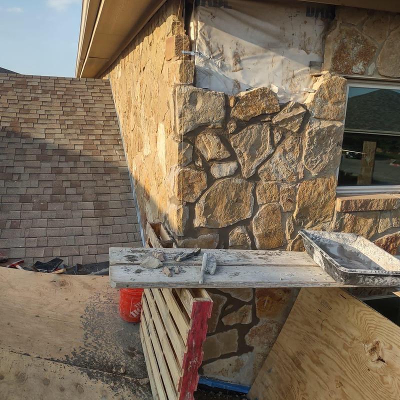 Exterior stone veneer with replacement stones and tools Exterior stone veneer with replacement stones and tools