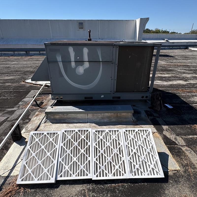 Commercial rooftop AC unit with air filters removed Commercial rooftop AC unit with air filters removed