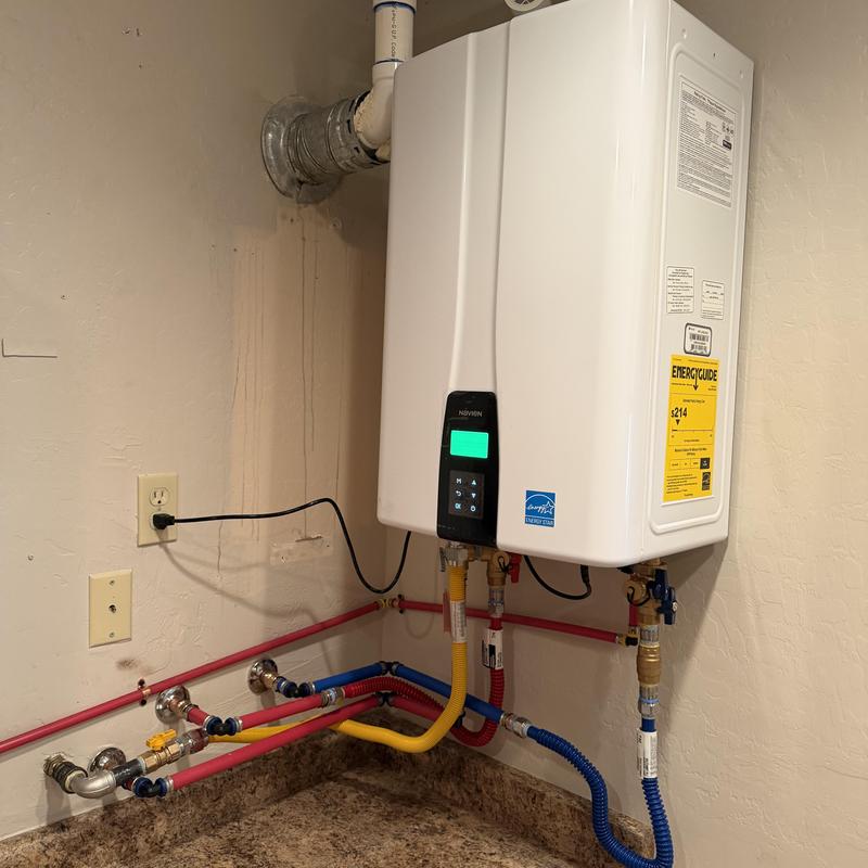 Navien 240 S2 tankless water heater with retrofitted waterlines Navien 240 S2 tankless water heater with retrofitted waterlines