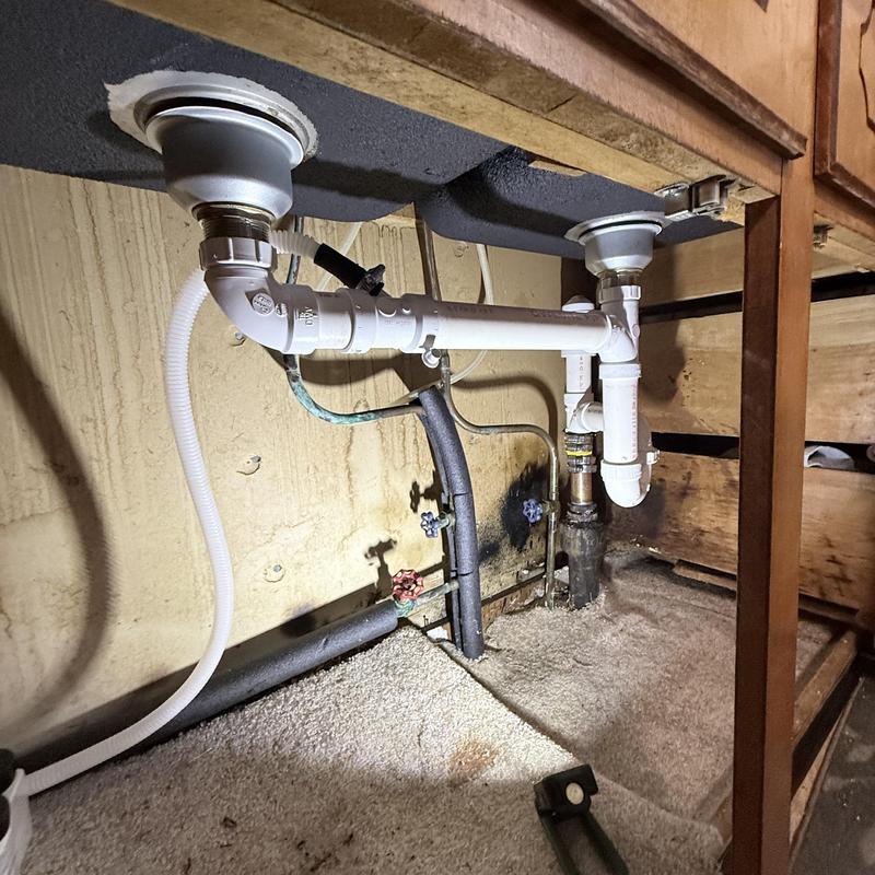 Kitchen sink drain pipes replacement under cabinet