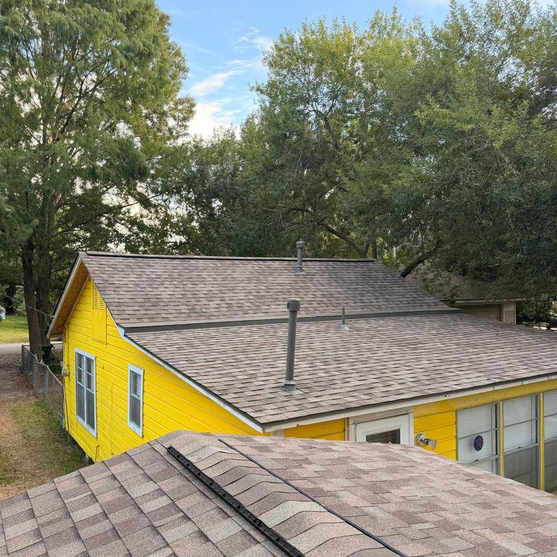 Tamko Titan XT shingle roof installation with vent pipes Tamko Titan XT shingle roof installation with vent pipes