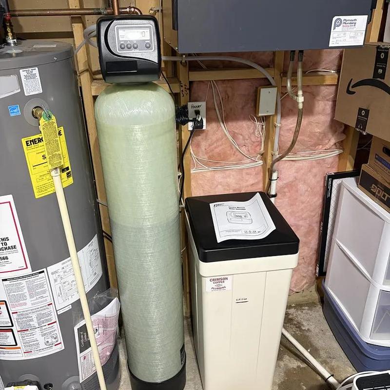 Water softener system with control valve installed in basement