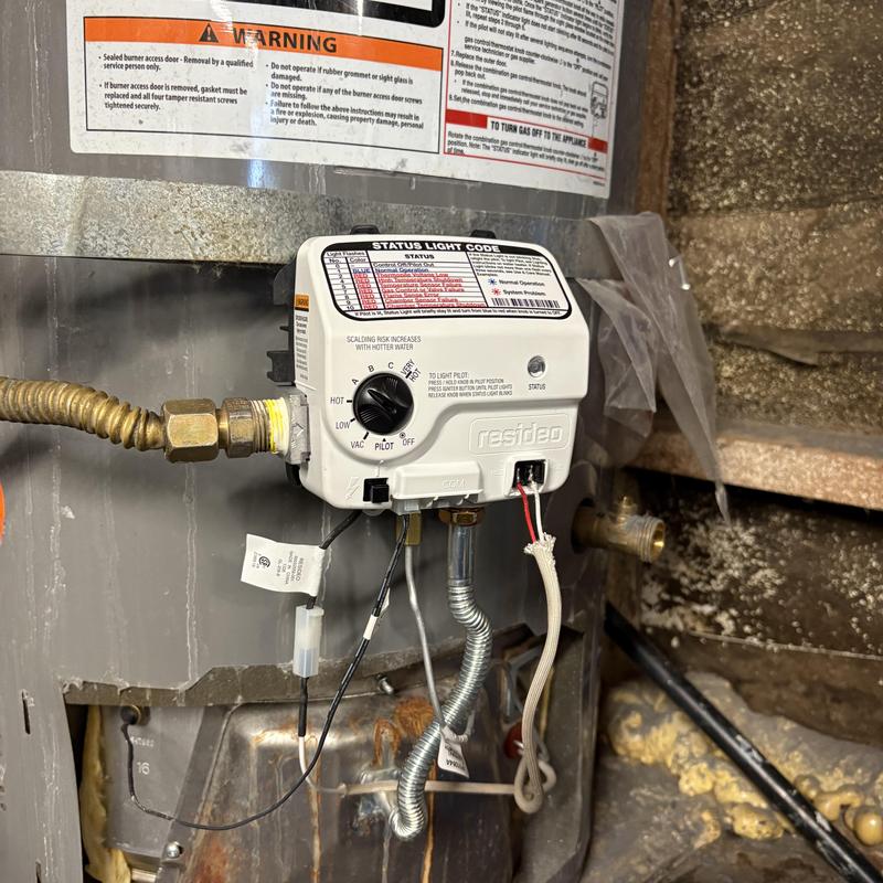 Gas control valve on furnace with wiring connections Gas control valve on furnace with wiring connections