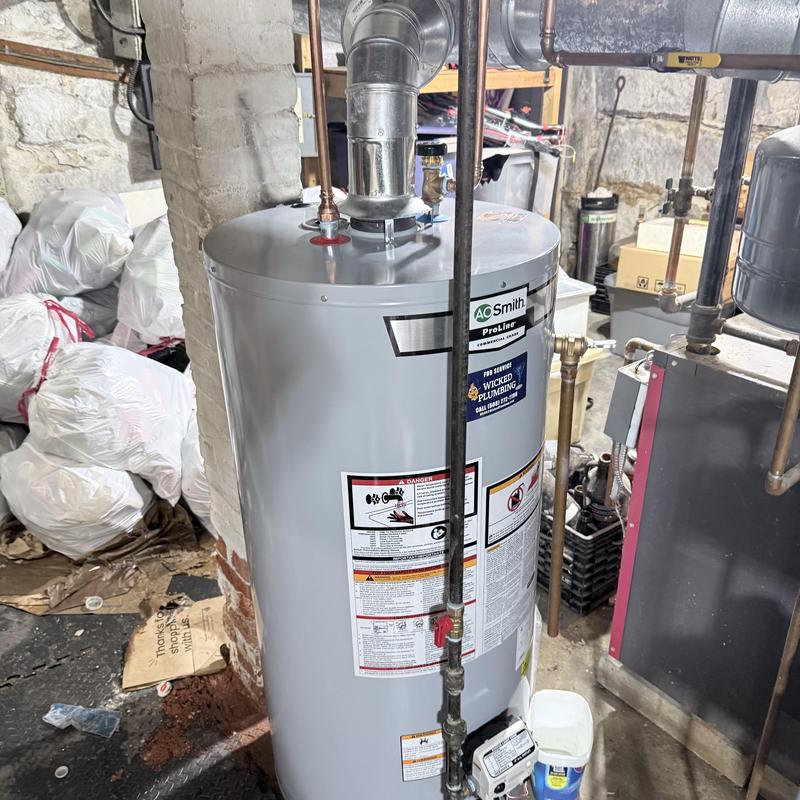Gas water heater replacement in basement setting