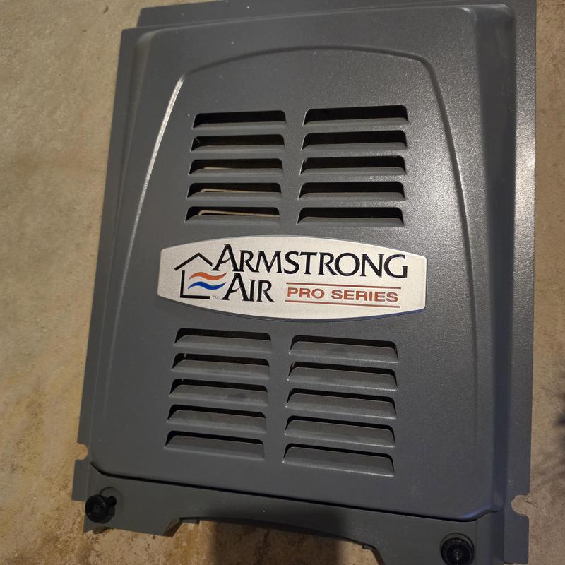 Armstrong Air furnace outer cover panel close-up Armstrong Air furnace outer cover panel close-up
