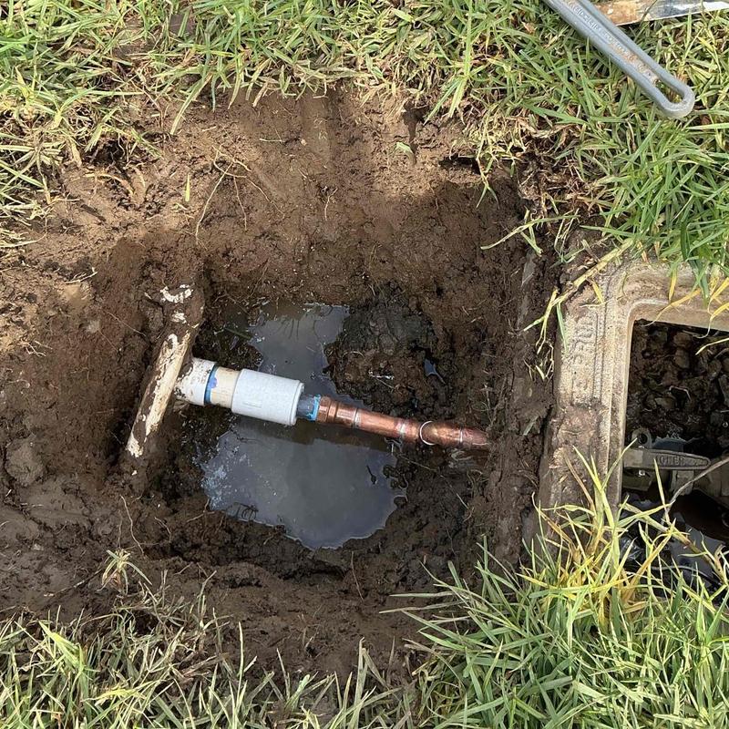 Main water service line with new copper pipe fittings