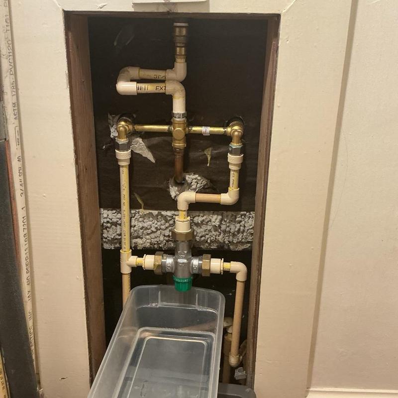 Shower mixing valve plumbing with leak inspection Shower mixing valve plumbing with leak inspection