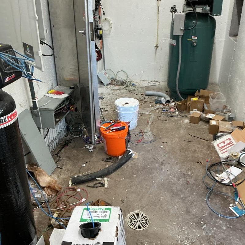 Floor drain and utility room plumbing installation site Floor drain and utility room plumbing installation site