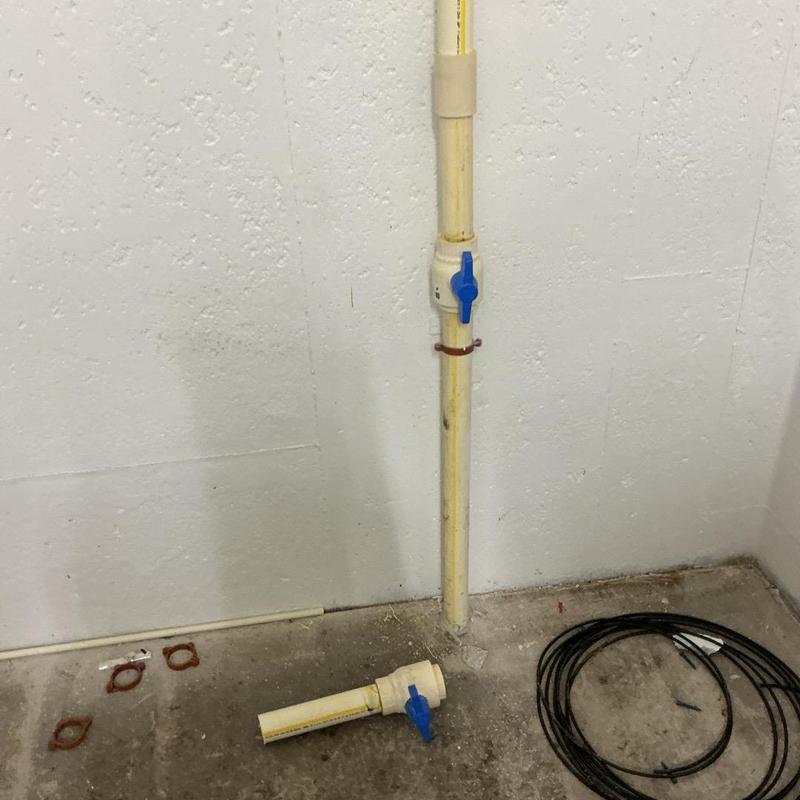 2-inch CPVC shut-off valve with pipe on floor 2-inch CPVC shut-off valve with pipe on floor