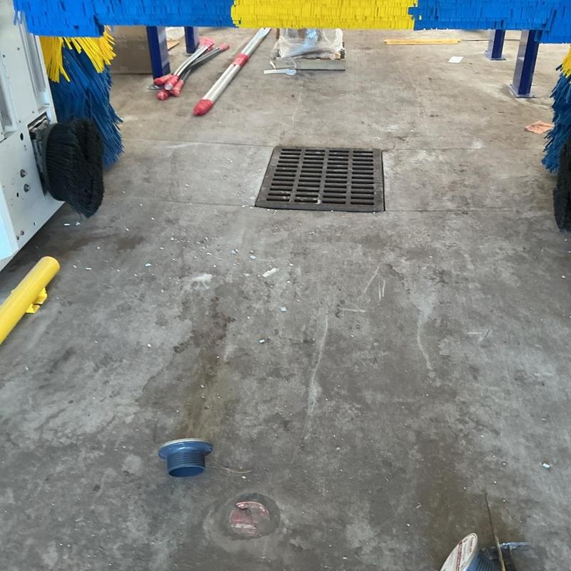 Floor cleanout cover and floor drains at car wash Floor cleanout cover and floor drains at car wash