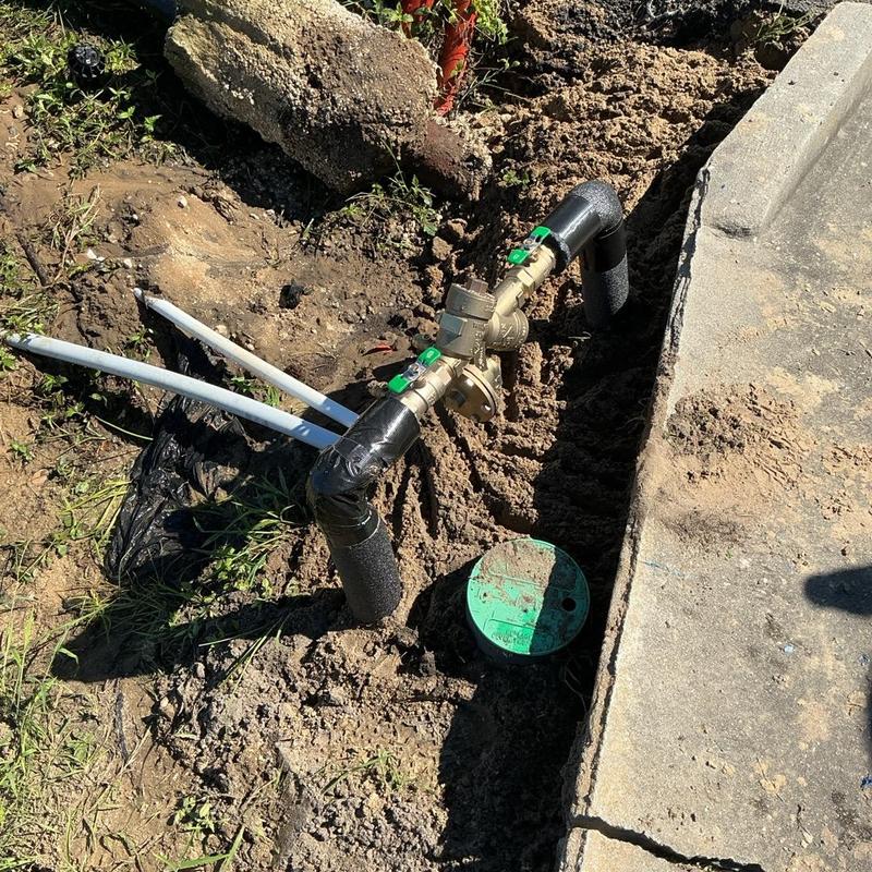 1-inch backflow preventer installation in soil trench 1-inch backflow preventer installation in soil trench