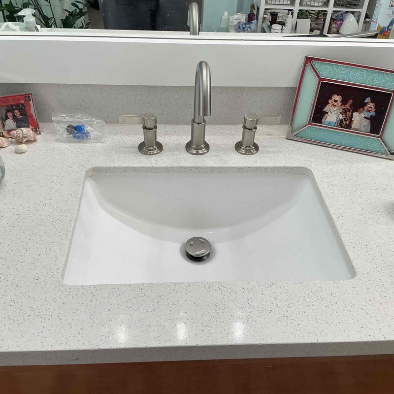Widespread bathroom faucet and pop-up drain installation