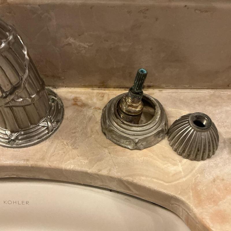 Antique bathroom faucet handle removed for repair Antique bathroom faucet handle removed for repair