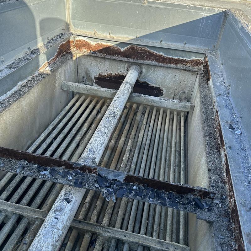 Evapco LSCB 120 condenser basin with rust and corrosion Evapco LSCB 120 condenser basin with rust and corrosion
