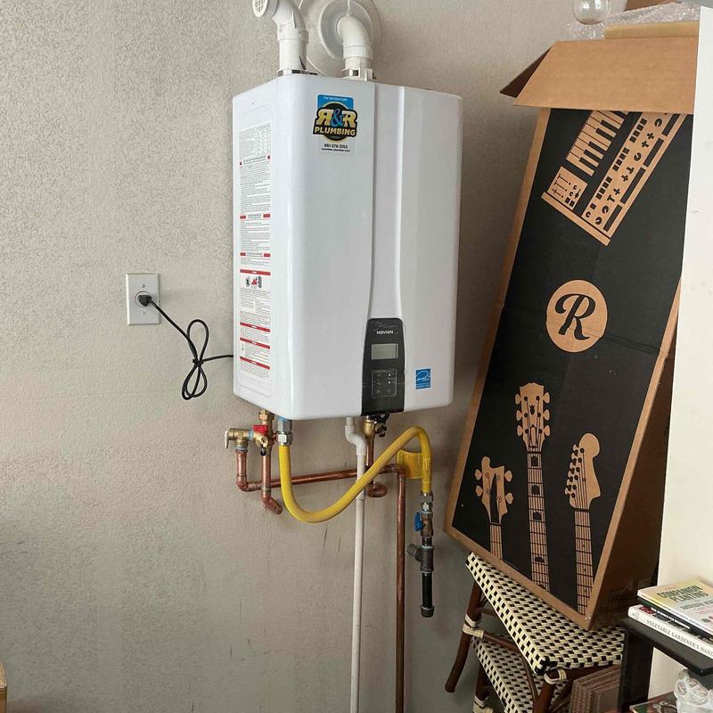 Navien 240A tankless water heater with piping modifications