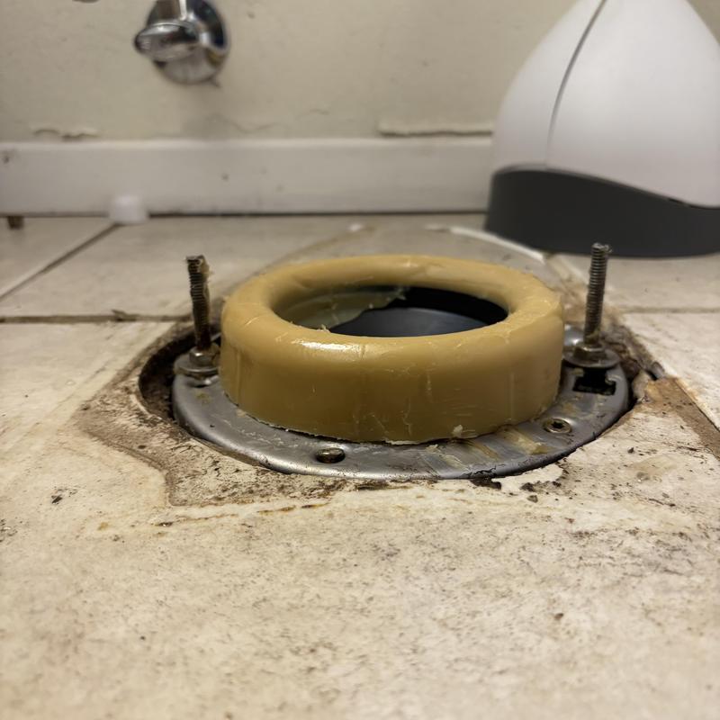 Wax ring toilet flange on tiled floor installation