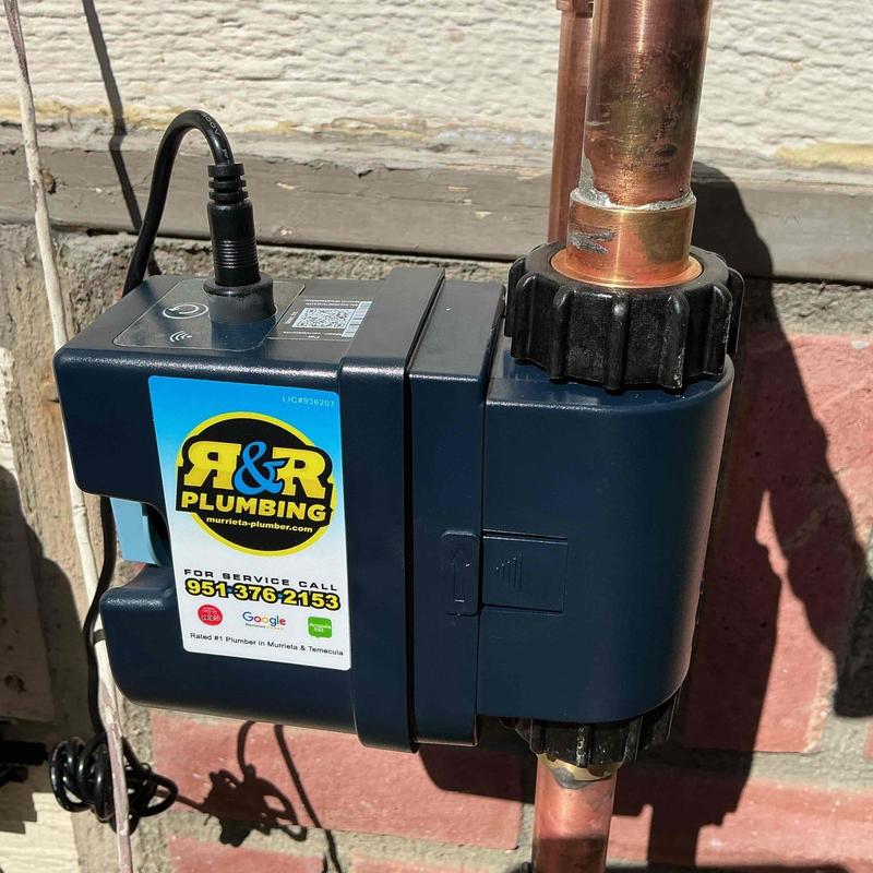 Moen Smart Water Monitor installed on copper pipe