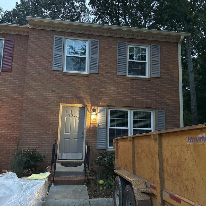 Asphalt shingle roof system on brick townhome Asphalt shingle roof system on brick townhome
