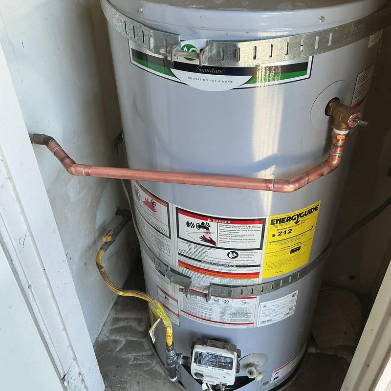 Gas sediment trap and T&P discharge line on water heater