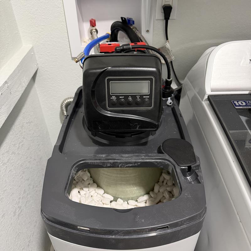 40,000 grain water softener with control valve in laundry room 40,000 grain water softener with control valve in laundry room