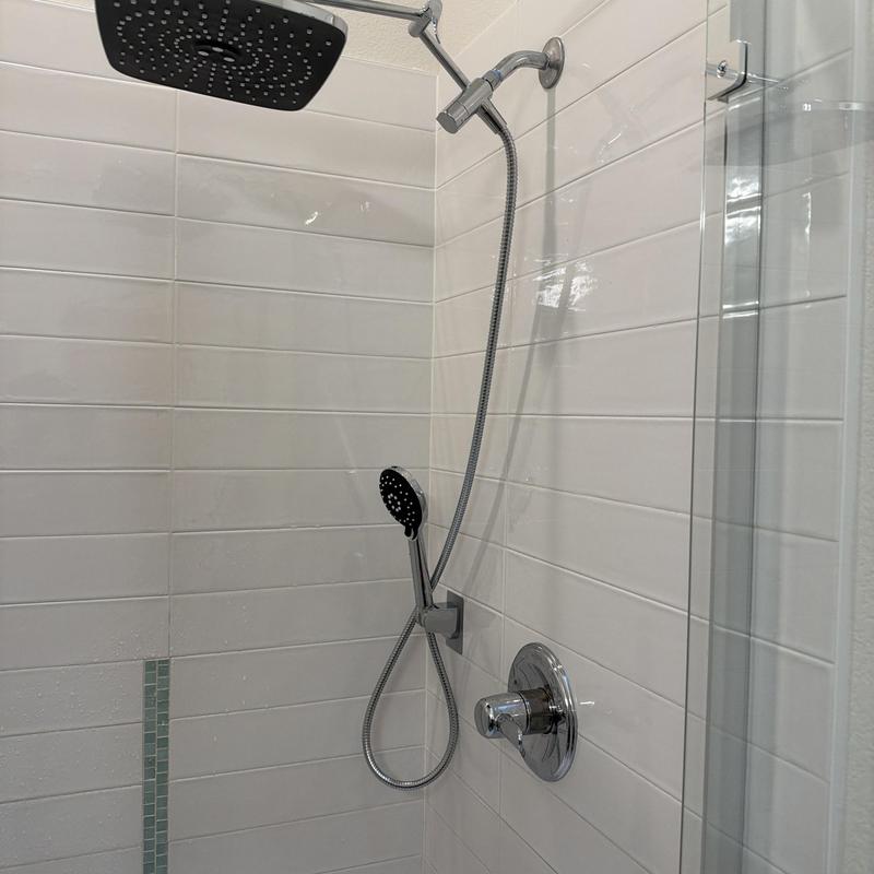 Shower system with rain and handheld showerheads