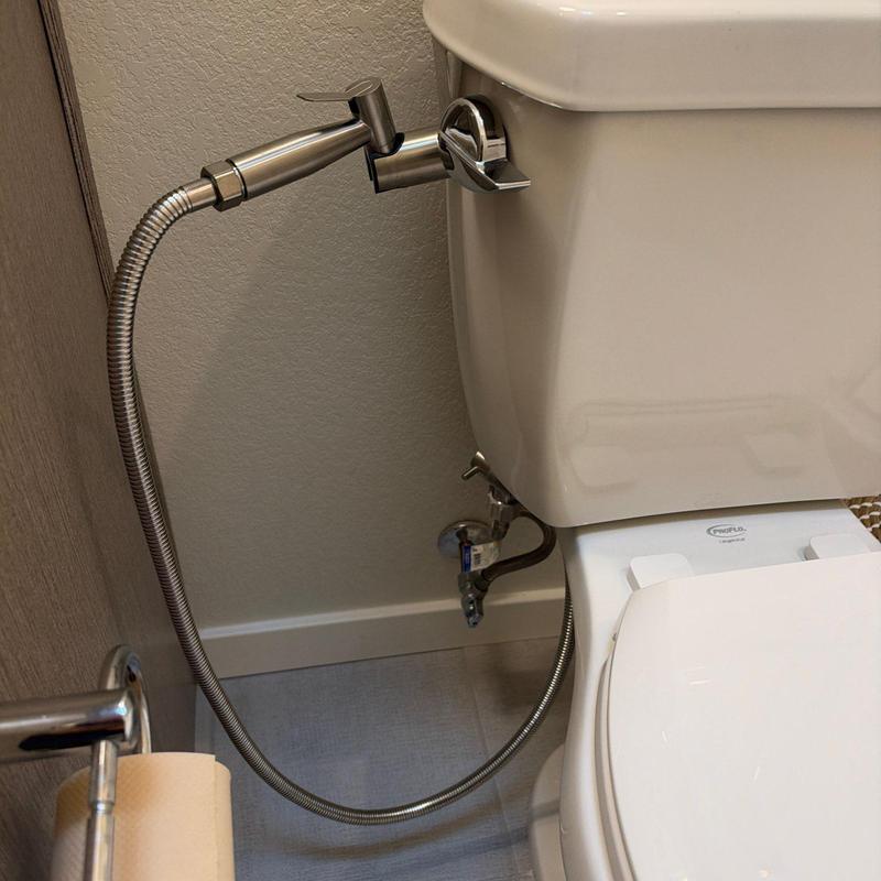Bidet spray hose installation on toilet tank
