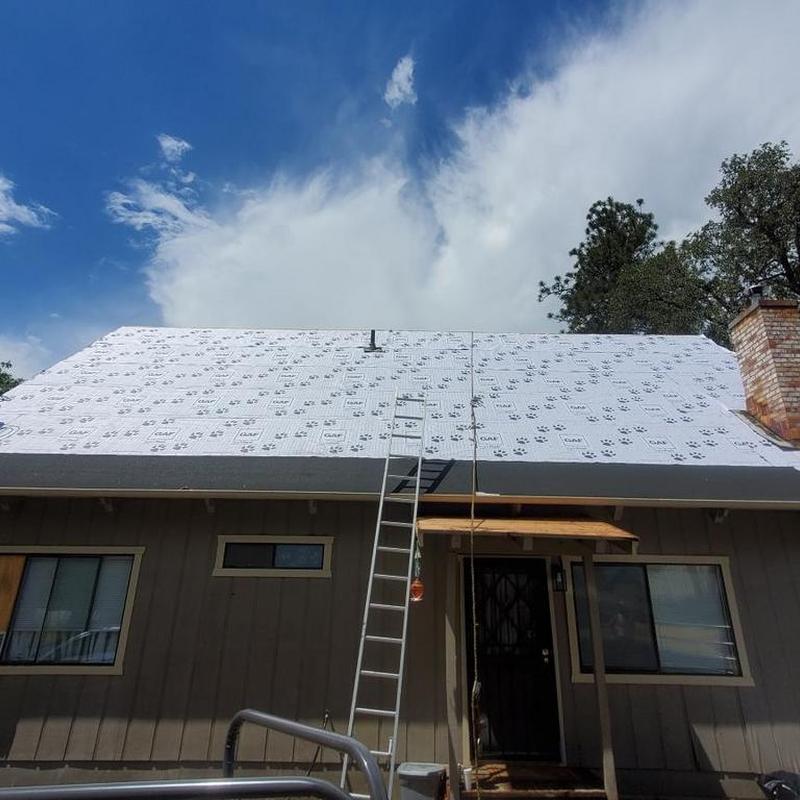 GAF roof underlayment installation on home roof