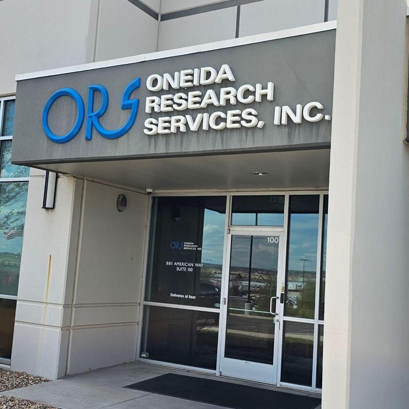 Commercial building entrance with company signage