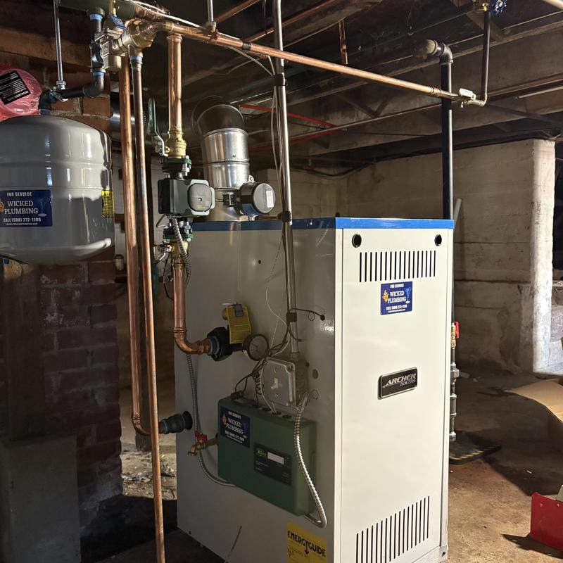 Boiler unit with copper piping and pressure tank installation