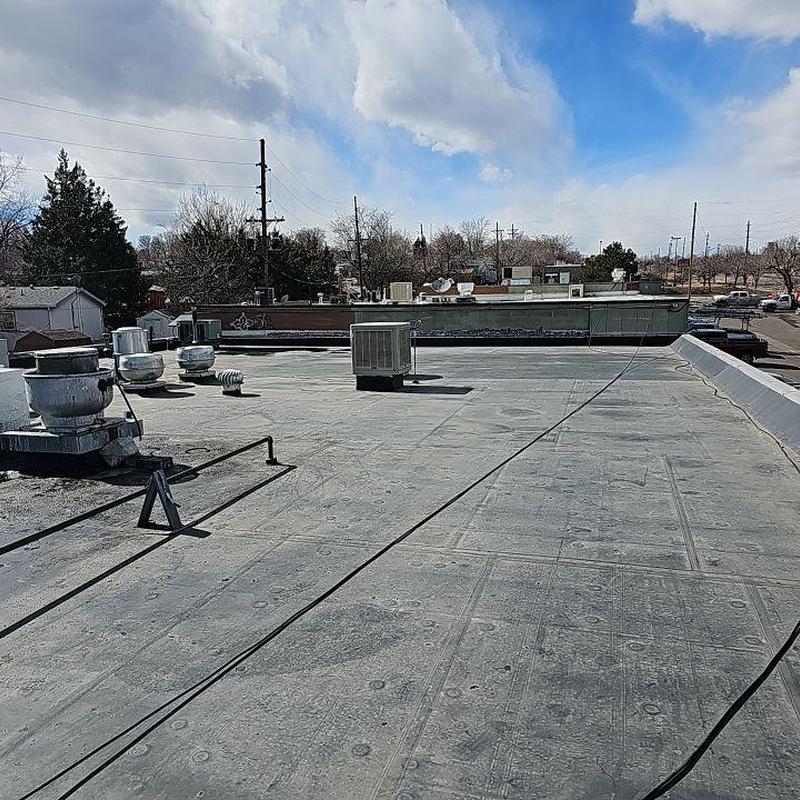 EPDM flat roof with vents and equipment on top EPDM flat roof with vents and equipment on top