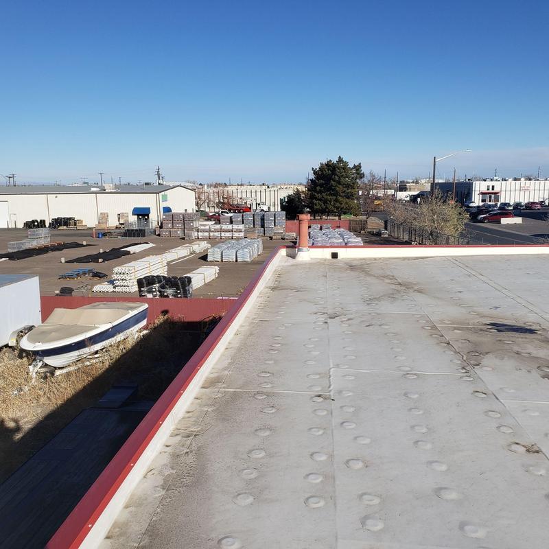 TPO flat roof with loose unit corners and pipe jacks TPO flat roof with loose unit corners and pipe jacks