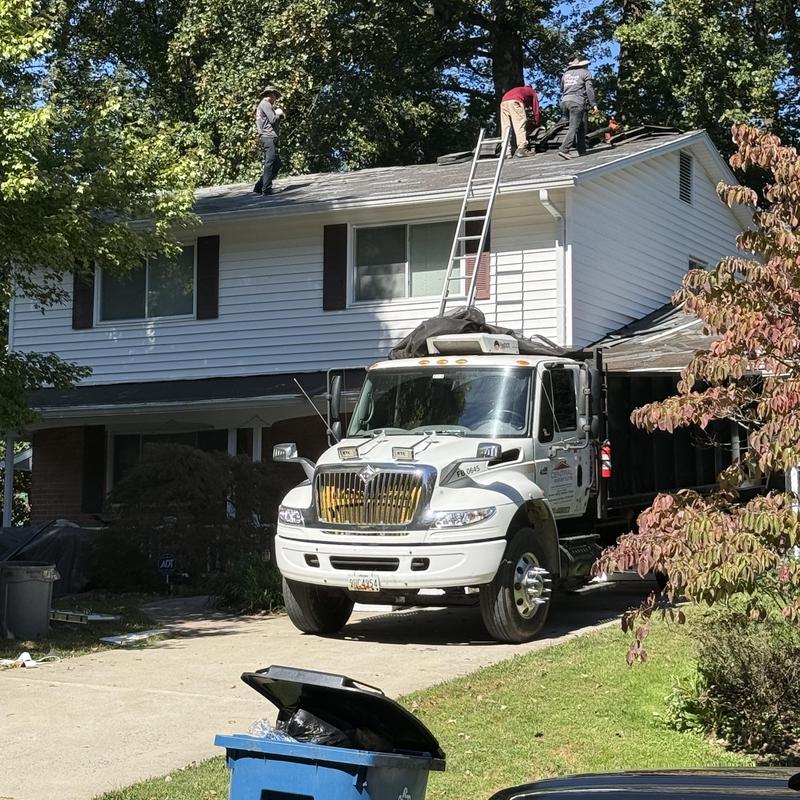Architectural shingles removal on residential roof Architectural shingles removal on residential roof
