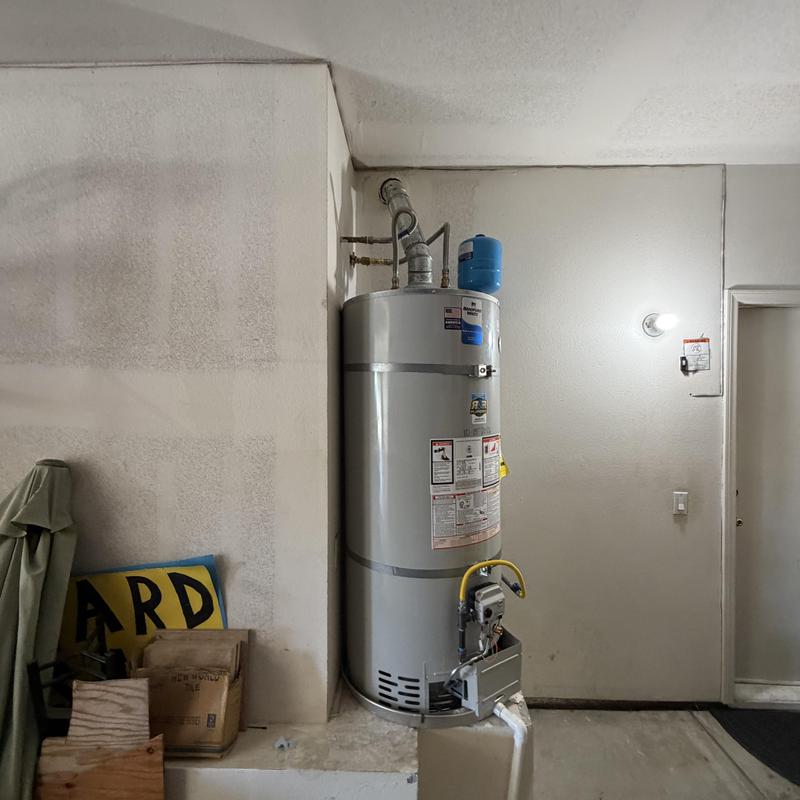 Natural gas water heater with expansion tank installed