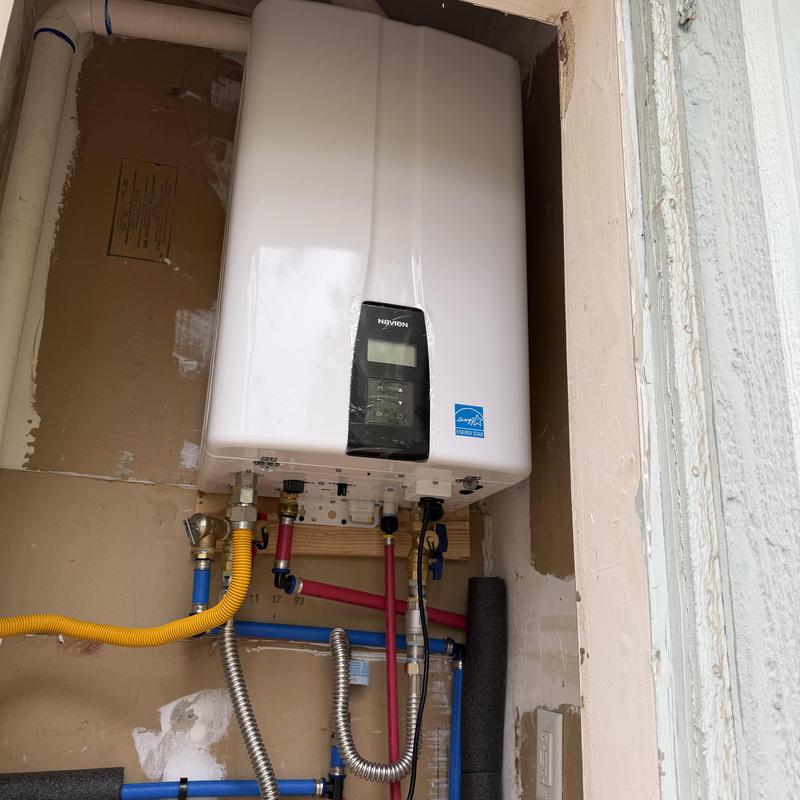Navien tankless water heater with plumbing and gas lines Navien tankless water heater with plumbing and gas lines