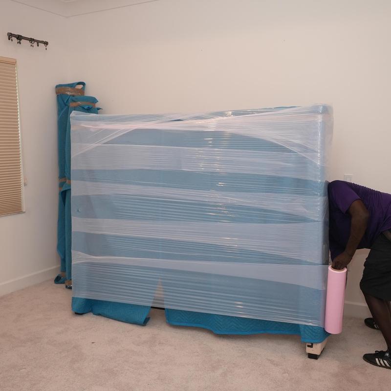 Mattress wrapping with plastic wrap for moving protection