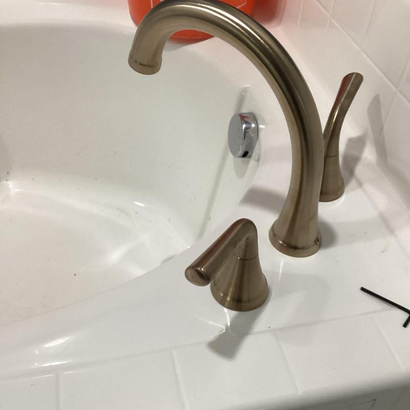 Roman tub faucet and handles installation on tub edge