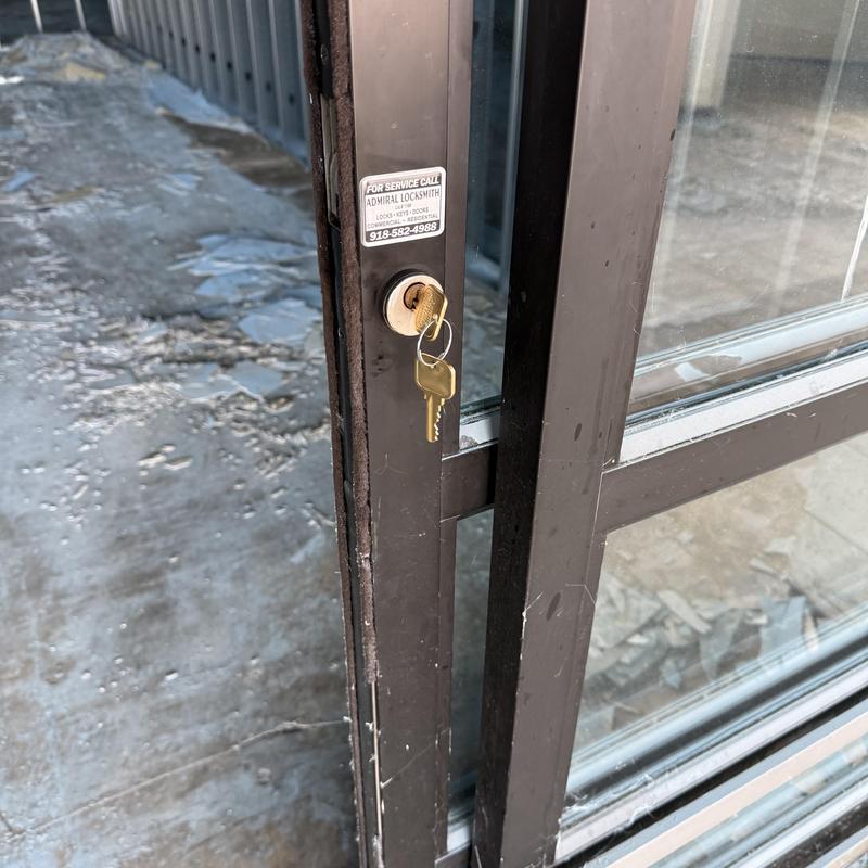 Door lock with key on commercial glass door in Tulsa Door lock with key on commercial glass door in Tulsa
