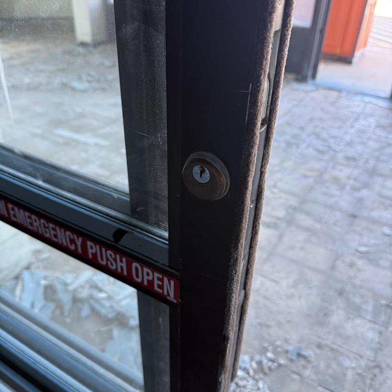 Exit device with alarm on commercial door lock Exit device with alarm on commercial door lock