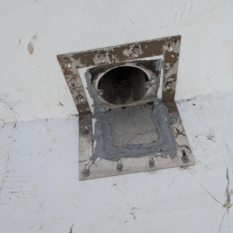 Commercial roof exhaust vent with sealant applied