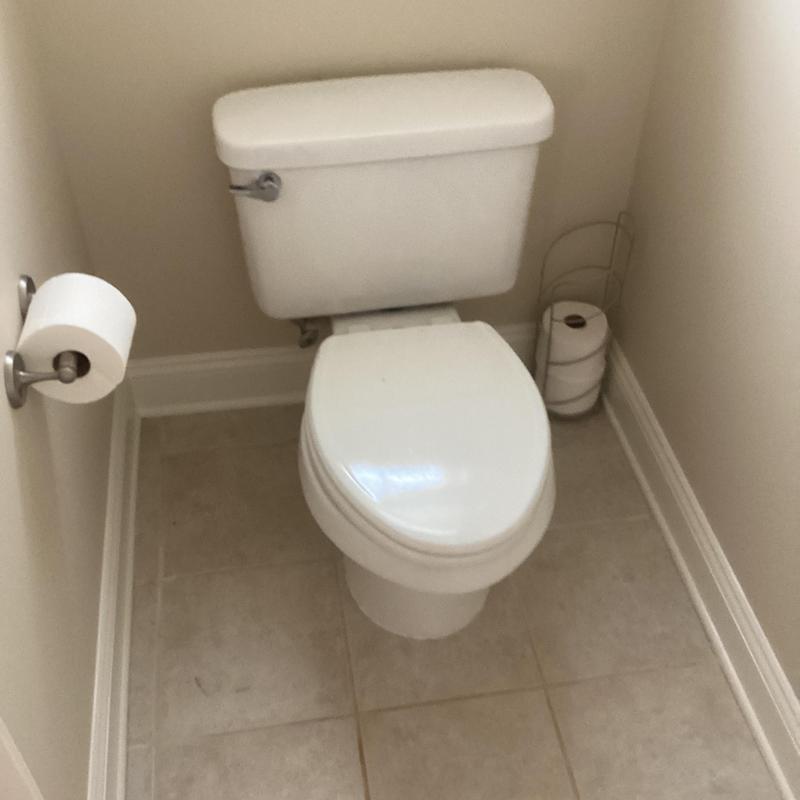 Toilet with new fill valve, flapper, and supply line Toilet with new fill valve, flapper, and supply line