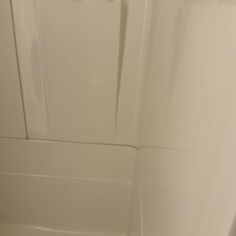 Fiberglass shower stall resealed silicone joints Fiberglass shower stall resealed silicone joints